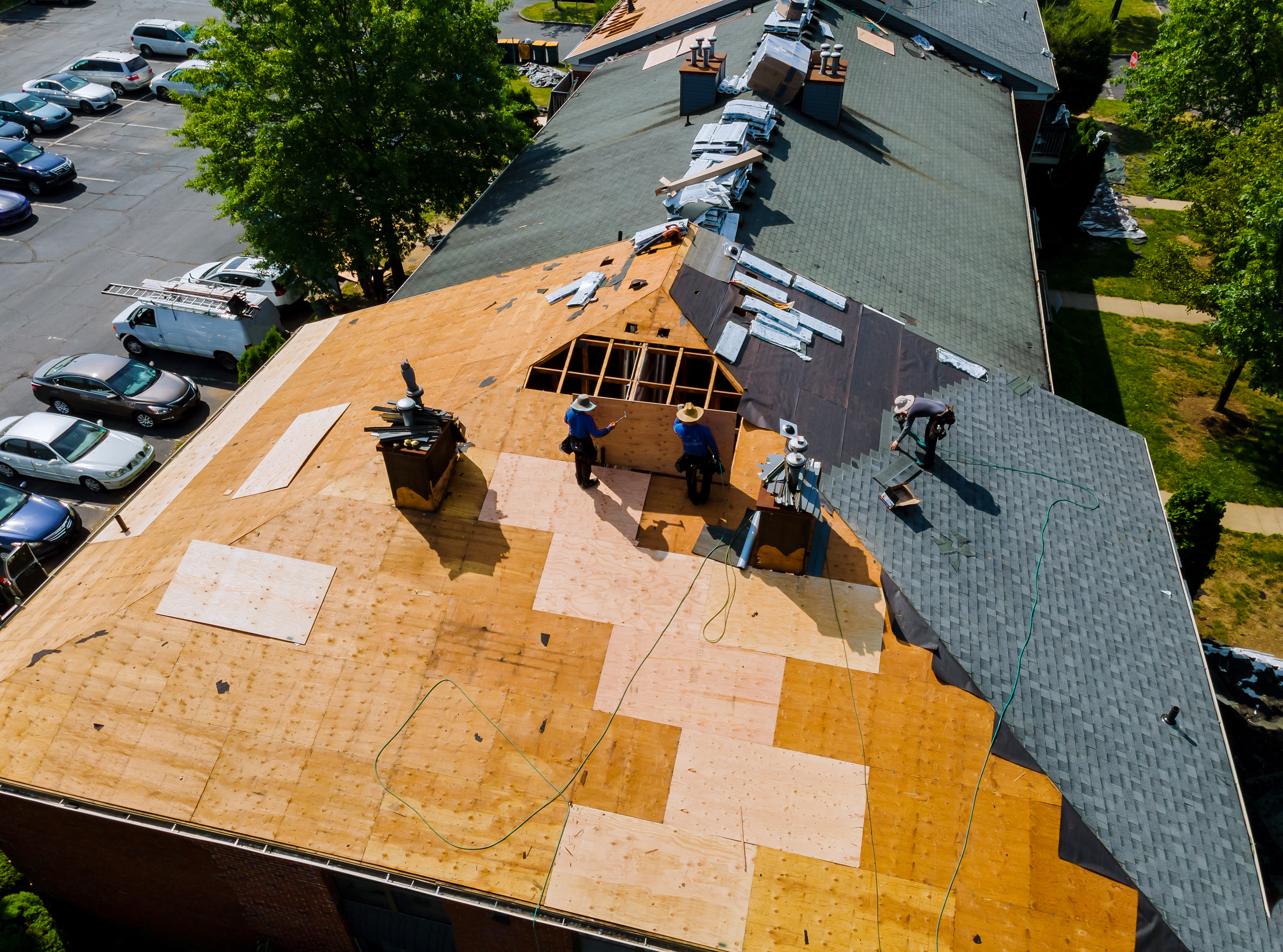 Roof installation being completed.